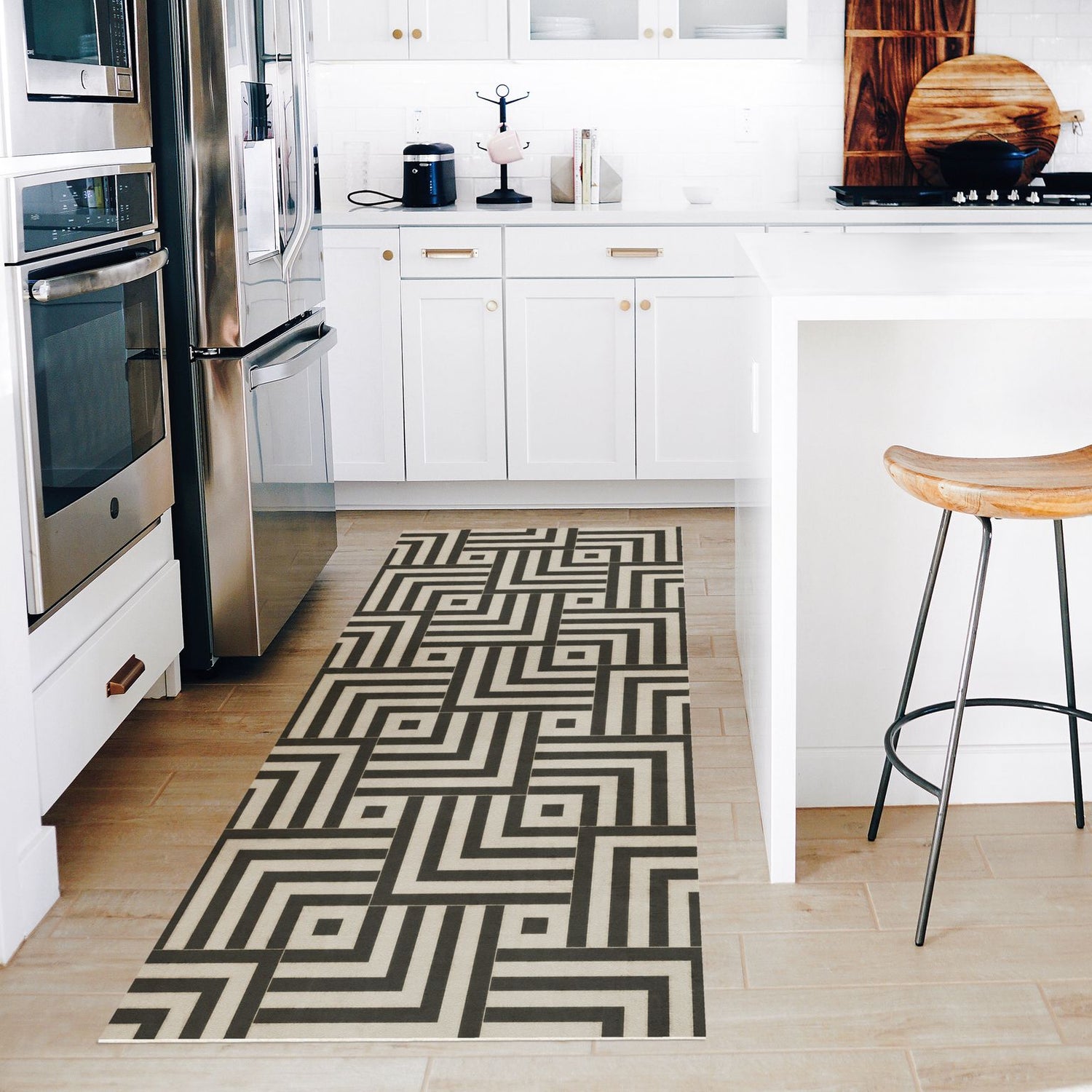 a black and white geometric pattern vinyl rug