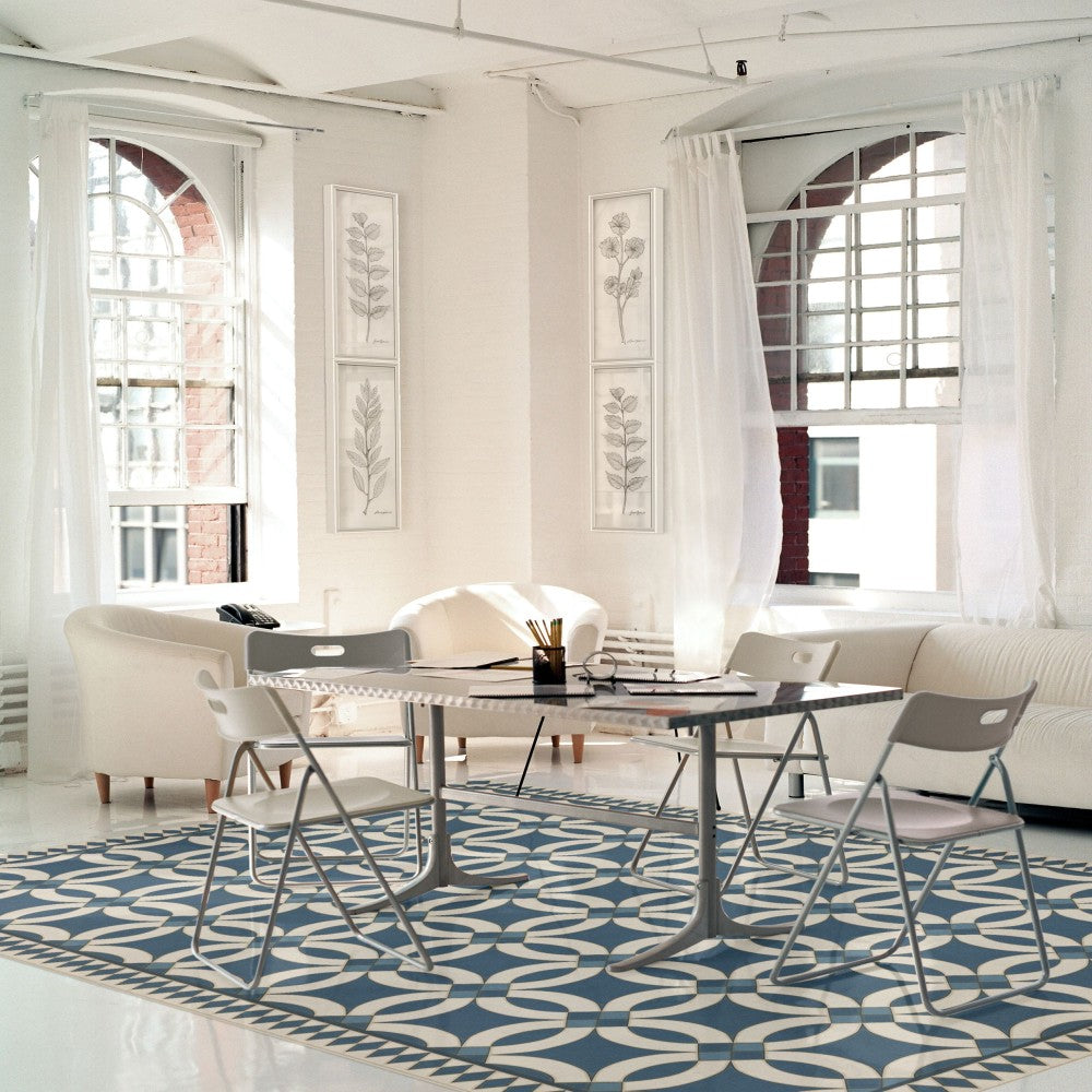 a blue and white vinyl rug in an apartment living room